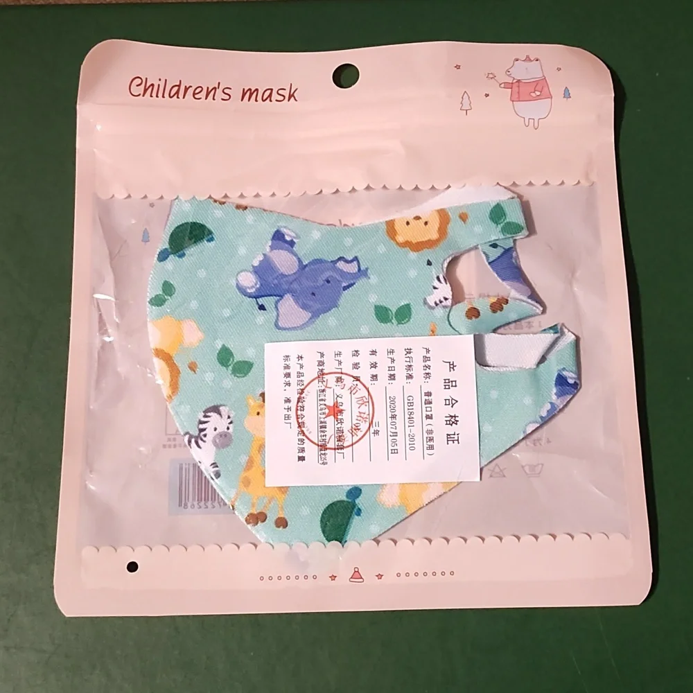 Children's re Usable face mask new in package never opened